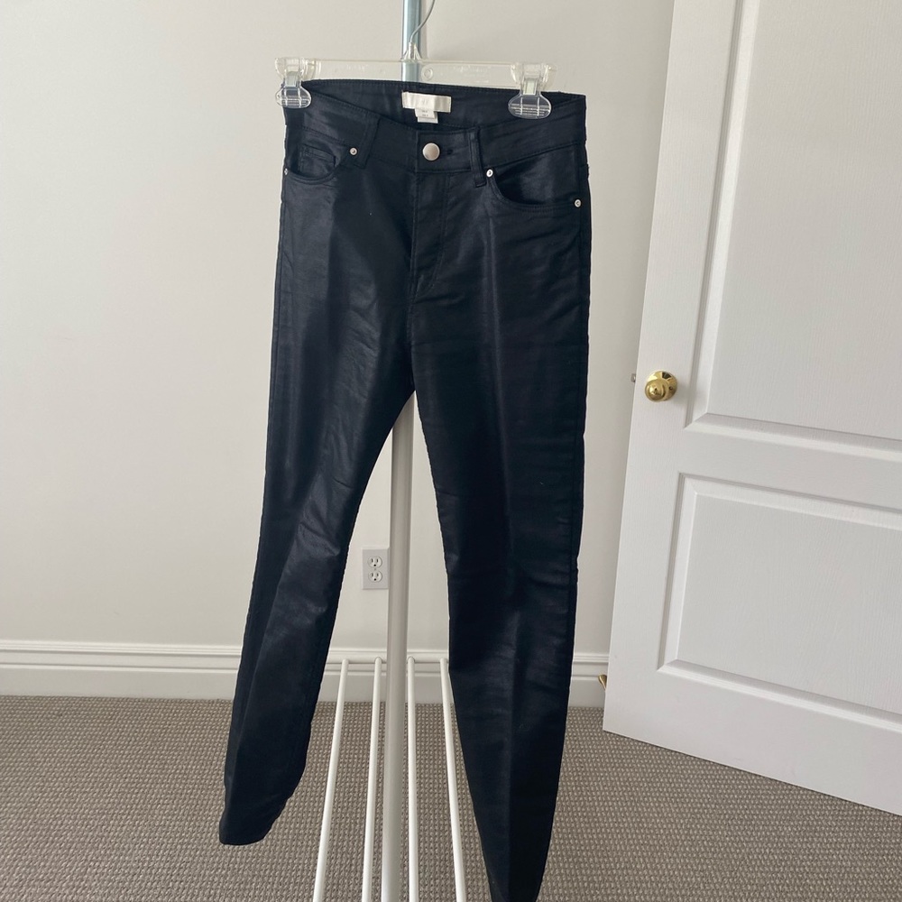 Black denim that has the look of leather jeans